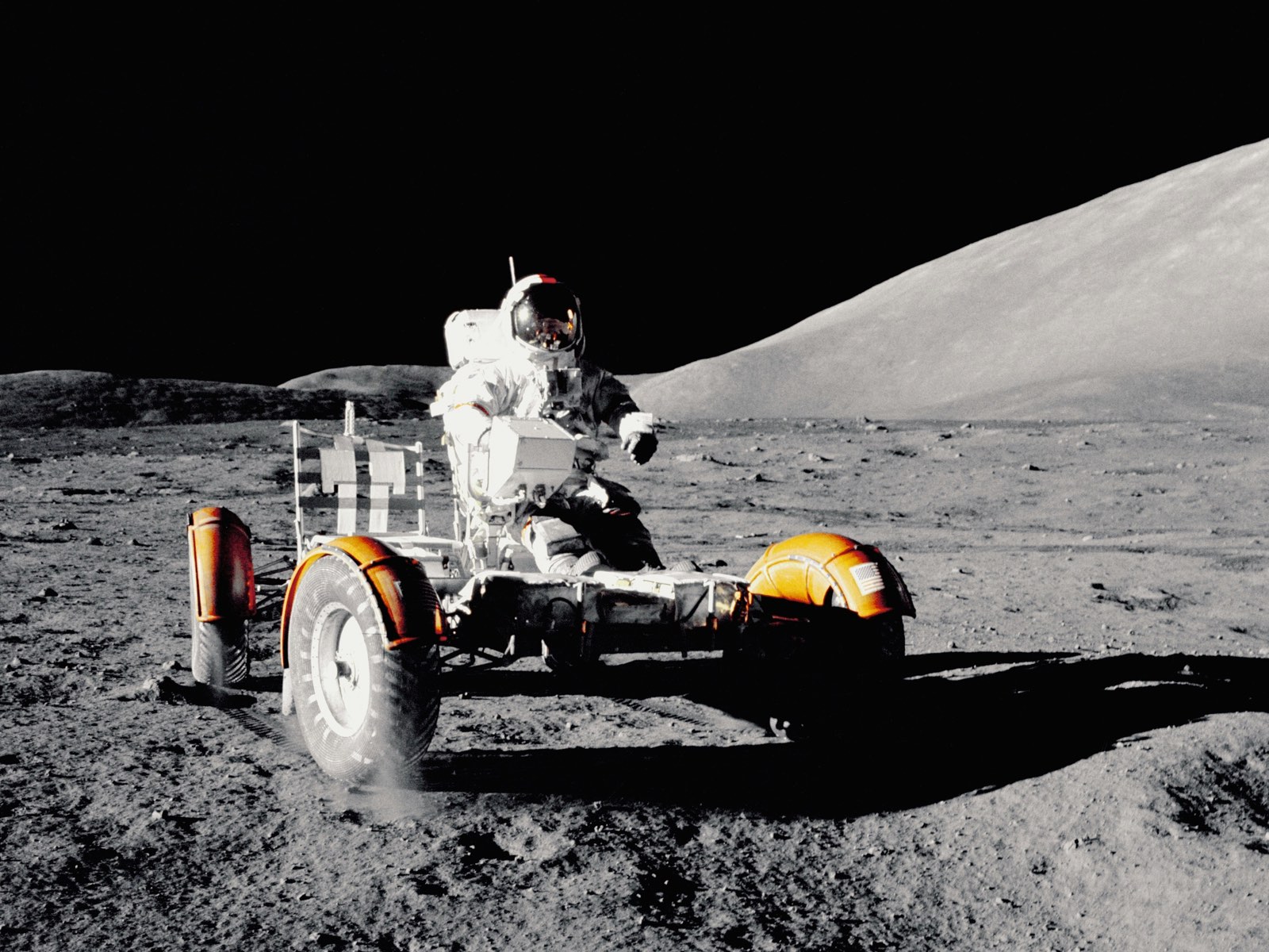 An astronaut on a lunar rover during the space race